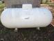 A large, white Sharp Energy propane tank sits on a grassy lawn near the home at 1188 Turner Rd, Creedmoor, NC 27522