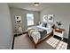 Cozy bedroom featuring a light-filled window and stylish decor for a serene and relaxing atmosphere at 1208 Wind Rose Dr, Fuquay Varina, NC 27526
