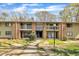 View of the apartment building and landscaped grounds at 1283 Schaub Dr # B, Raleigh, NC 27606