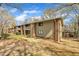Exterior of a brick and siding apartment building with well-maintained landscaping at 1283 Schaub Dr # B, Raleigh, NC 27606