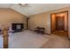 Neutral living room with carpet, ample lighting, and easy access to other rooms at 133 Grassy Rio Ln, Garner, NC 27529