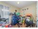 Cluttered bedroom with wood floors, a window, and other home goods at 141 Saige Ct, Burlington, NC 27217