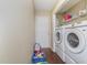 Laundry room featuring new front-load washer and dryer set and overhead shelving at 141 Saige Ct, Burlington, NC 27217