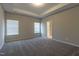 Spacious bedroom featuring recessed lighting, plush carpeting, and two windows at 144 E Victory View Ter # 66, Smithfield, NC 27577
