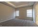 Spacious bedroom featuring recessed lighting, plush carpeting, and two windows at 144 E Victory View Ter # 66, Smithfield, NC 27577