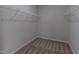 Carpeted walk-in closet with wire shelving at 144 E Victory View Ter # 66, Smithfield, NC 27577