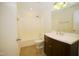 Bright bathroom with a modern vanity, stylish fixtures, and a clean, well-maintained shower-tub combination at 1505 Harth Dr, Garner, NC 27529