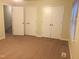 Bedroom with closet and window at 1505 Harth Dr, Garner, NC 27529