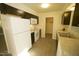 Spacious kitchen featuring modern appliances, sleek countertops, and ample cabinet space for storage at 1505 Harth Dr, Garner, NC 27529