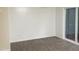 Open living space with a sliding glass door to the back at 1505 Harth Dr, Garner, NC 27529