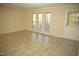 Open concept living room with multiple windows allowing for natural light at 1505 Harth Dr, Garner, NC 27529