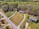 From above, the house sits on a green lot with mature trees in a quiet residential area at 188 Hunter Ln, Zebulon, NC 27597