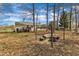Inviting backyard with patio seating area and a fire pit is perfect for relaxation and entertaining guests at 188 Hunter Ln, Zebulon, NC 27597