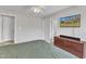 Bright bedroom with a TV, dresser, and light-colored walls for a modern feel at 188 Hunter Ln, Zebulon, NC 27597