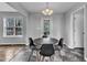 Eat in dining area with black table and chairs at 188 Hunter Ln, Zebulon, NC 27597