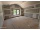 Spacious bedroom with large window and vaulted ceiling is ready for finishing touches at 1945 Cranes Creek Rd, Cameron, NC 28326