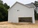 Side view of home showing the two car garage at 1945 Cranes Creek Rd, Cameron, NC 28326