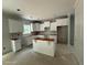 Spacious kitchen with white cabinets and recessed lighting at 1945 Cranes Creek Rd, Cameron, NC 28326