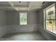 Unfinished living room featuring windows, recessed lights, and decorative molding at 1945 Cranes Creek Rd, Cameron, NC 28326