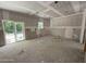 Spacious unfinished room with sliding glass doors, a bright window, and wiring ready for customization at 1945 Cranes Creek Rd, Cameron, NC 28326