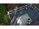 Aerial view of a spacious back deck featuring outdoor seating and a decorative rug at 2000 Mountain Laurel Dr, Clayton, NC 27527