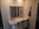 Charming bathroom with a double-sink vanity, decorative mirror, and ample storage, providing a blend of elegance and functionality at 2000 Mountain Laurel Dr, Clayton, NC 27527