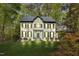 Beautiful two-story home with a well-manicured lawn and mature trees, providing great curb appeal at 201 Wortham Dr, Raleigh, NC 27614