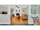 Spacious living room with a fireplace, hardwood floors, and views of the outdoors at 201 Wortham Dr, Raleigh, NC 27614
