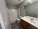 Cozy bathroom with neutral walls, vanity and a tub-shower combination at 247 Anna St, Lillington, NC 27546