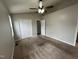 Large bedroom featuring a ceiling fan, closet, and neutral wall colors at 247 Anna St, Lillington, NC 27546
