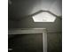 Attic space with a high ceiling and window at 2904 Jefferson Davis Hwy, Sanford, NC 27332
