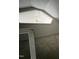 Attic area with window and ceiling fan at 2904 Jefferson Davis Hwy, Sanford, NC 27332