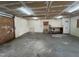 Large unfinished basement with concrete floors, exposed ceiling, and utility features at 2904 Jefferson Davis Hwy, Sanford, NC 27332