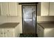 Hallway view through kitchen highlights great layout, ideal for hosting and entertaining at 2904 Jefferson Davis Hwy, Sanford, NC 27332