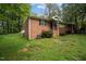 Charming brick and siding home with a cozy front porch and well-maintained lawn at 313 Main St, Knightdale, NC 27545
