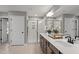 Elegant bathroom with double vanity, walk-in shower, and sleek fixtures offers a modern and functional design at 323 Augusta Pond Way # 171, Raleigh, NC 27603