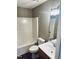Standard bathroom featuring a shower-tub combo, toilet, and single sink vanity at 3316 Perkins Ridge Rd, Raleigh, NC 27610