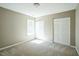 Bright bedroom featuring plush carpeting, neutral paint colors, and a window at 3316 Perkins Ridge Rd, Raleigh, NC 27610