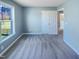 Carpeted bedroom featuring natural light from the window and a closet for plenty of storage at 357 Riverwood Dr, Clayton, NC 27527