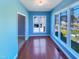 Bright living space featuring wood floors and large windows at 357 Riverwood Dr, Clayton, NC 27527