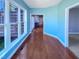 Sun room with wood floors and bright windows at 357 Riverwood Dr, Clayton, NC 27527