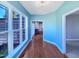 Sun room with wood floors and a view of the kitchen at 357 Riverwood Dr, Clayton, NC 27527