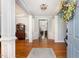 Grand foyer featuring hardwood floors, elegant chandelier, and open entryway offering a welcoming ambiance at 3601 Tartancroft Pl, Fuquay Varina, NC 27526