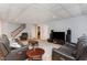 Finished basement features an accent ceiling, recessed lighting, and two comfortable leather reclining sofas at 3601 Tartancroft Pl, Fuquay Varina, NC 27526
