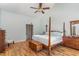 Spacious main bedroom boasts vaulted ceilings, wood floors, and ensuite bathroom access at 3601 Tartancroft Pl, Fuquay Varina, NC 27526