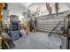 Spacious garage with overhead storage, epoxy flooring, and a convenient automatic door to keep your vehicles and belongings secure at 390 Lake Magnolia Way, Smithfield, NC 27577
