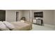 Cozy bedroom with a modern design, neutral tones, carpet flooring, and a television on the wall at 3908 Cedar Knolls Dr, Youngsville, NC 27596