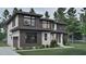 Modern home with mixed siding, large windows, and well-manicured landscaping at 3908 Cedar Knolls Dr, Youngsville, NC 27596