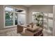 Inviting home office with large window, a contemporary desk, and ample natural light at 3908 Cedar Knolls Dr, Youngsville, NC 27596
