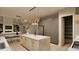 Open concept kitchen with a marble island, stainless appliances, and seamless flow to dining and living at 3908 Cedar Knolls Dr, Youngsville, NC 27596